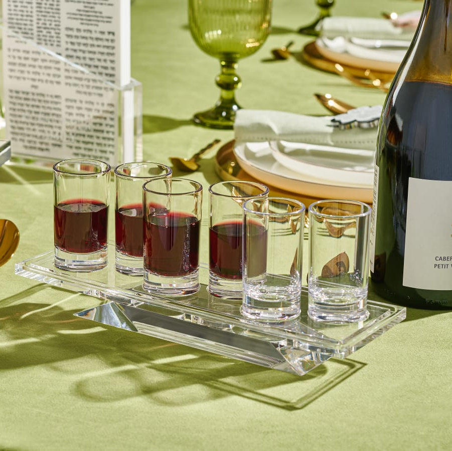 L'Chaim Liquor Set filled with wine on a green tablecloth - Zstander