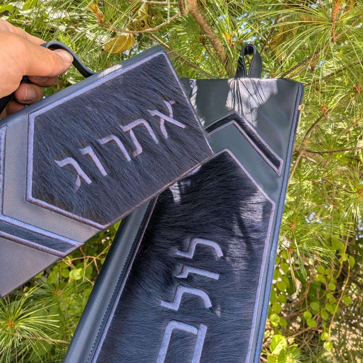 matching nav lulav and esrog bag near trees - Zstander