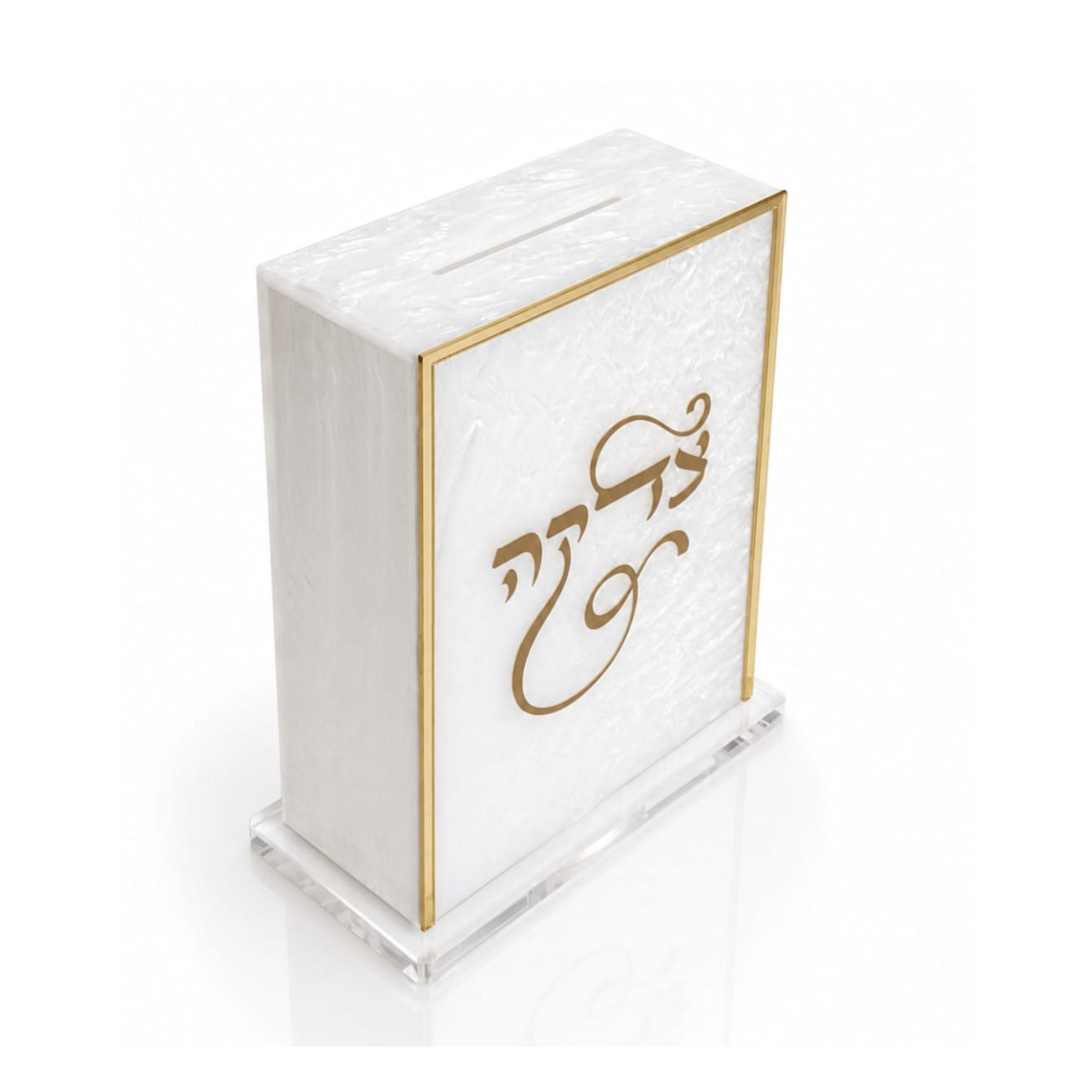 A white marble and acrylic tzedakah box with gold trim and Hebrew lettering on the front, set against a clean white background - Zstander