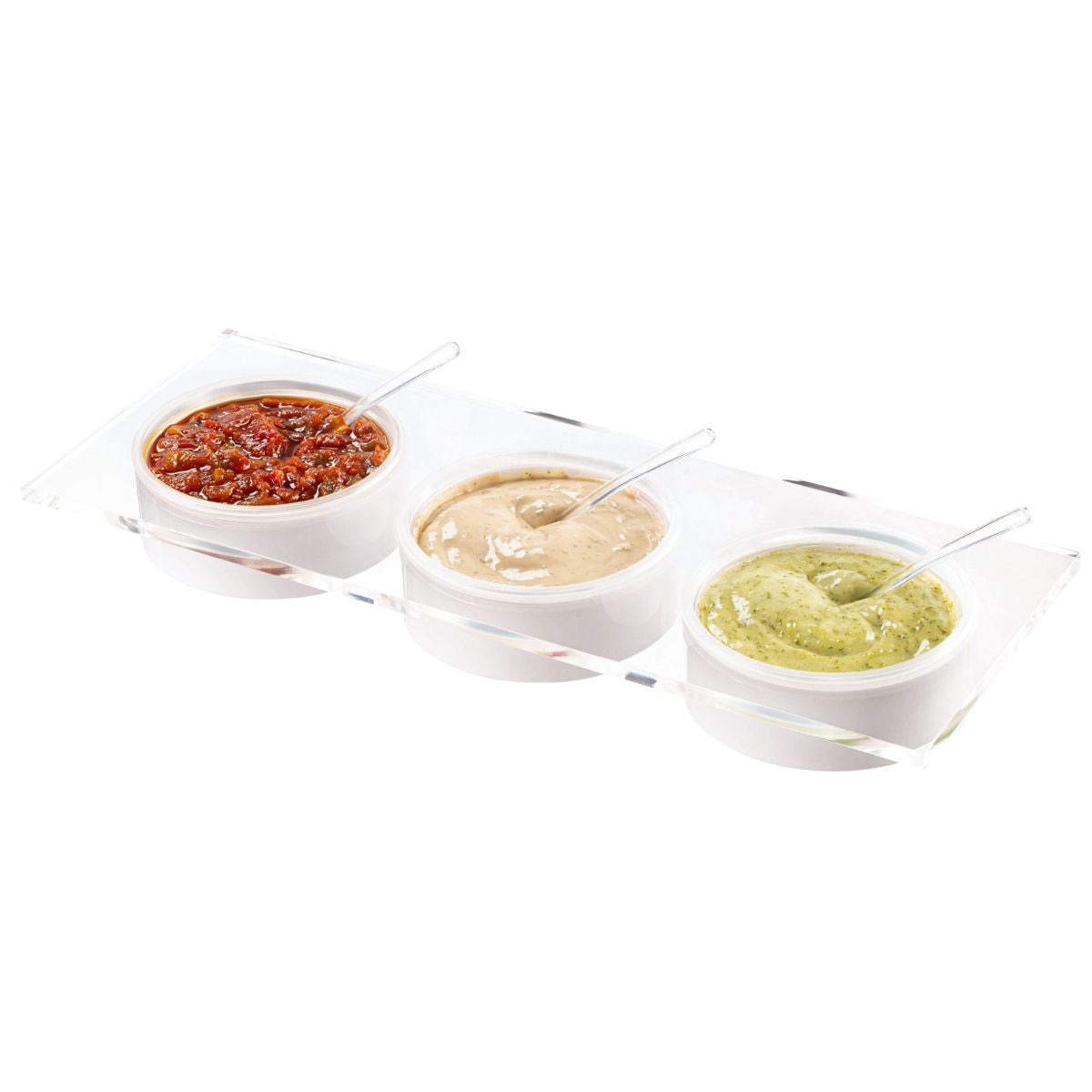Three small bowls with different sauces on a white background - Zstander