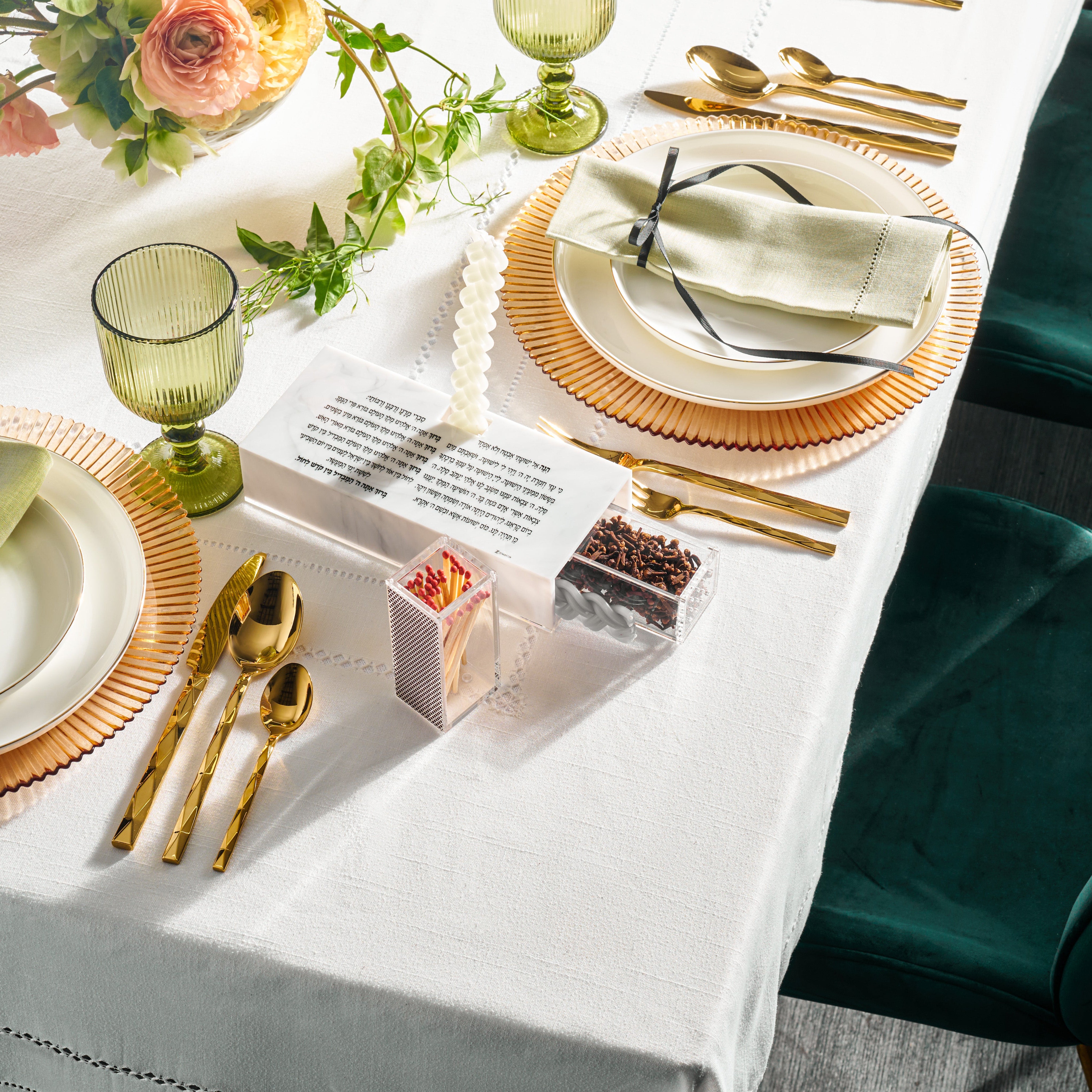 A set of tableware on a dining table, including plates, glasses, and cutlery, with a focus on a Havdalah Set with a magnetic lid and a candle holder - Zstander