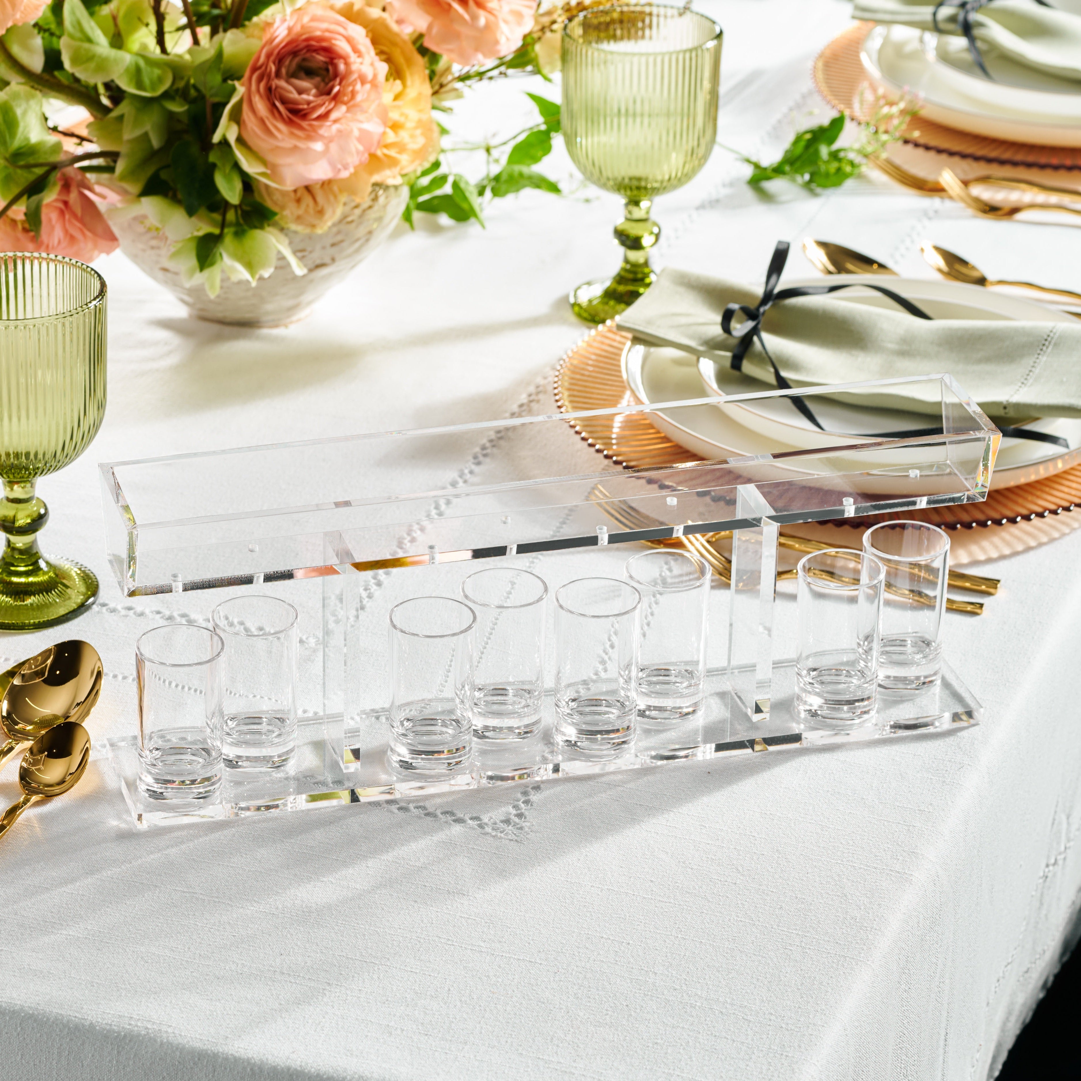 Clear acrylic kiddush fountain on a set shabbos table - Zstander