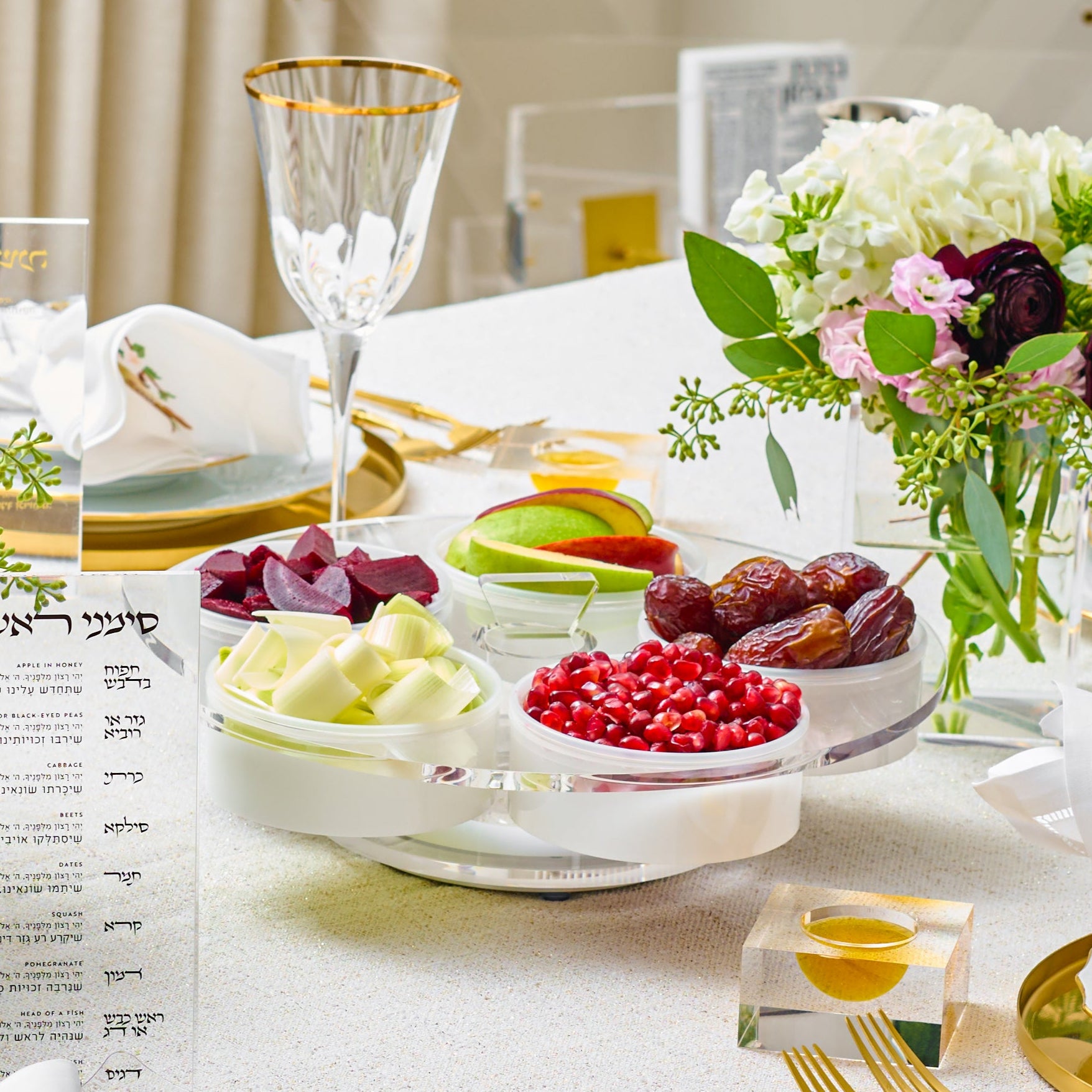 Elegant dining table set with floral arrangements, silverware, and place settings - Zstander