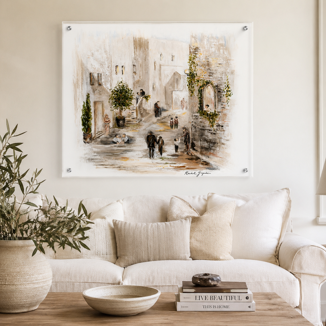 Living room with a large wall art piece, white sofa, and decorative items - Zstander