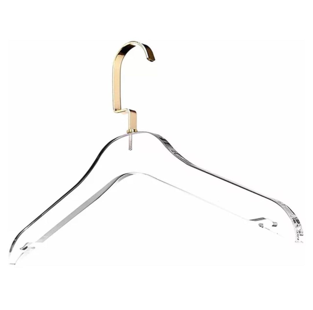 A clear flat lucite hanger with a gold hook. - Zstander