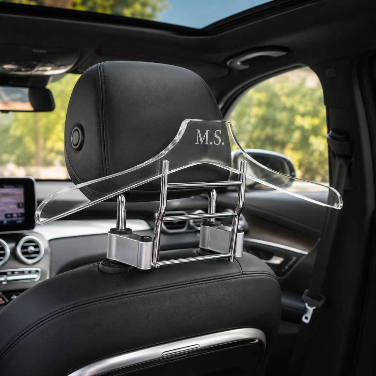 lucite car hanger hanging in a car on the headrest - Zstander