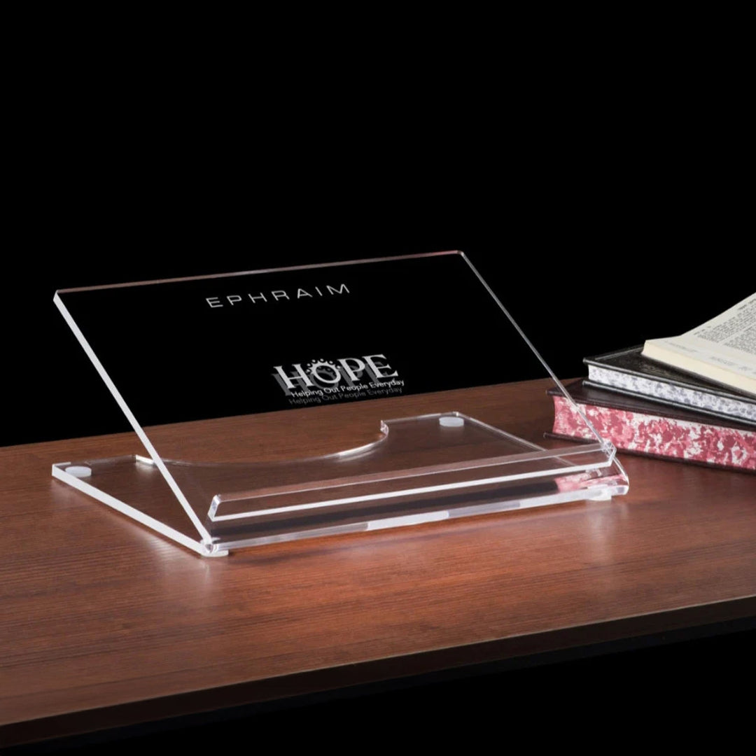 Clear acrylic Tabletop shtender on a wooden surface with 'Ephraim' and 'Hope'  engraved - Zstander