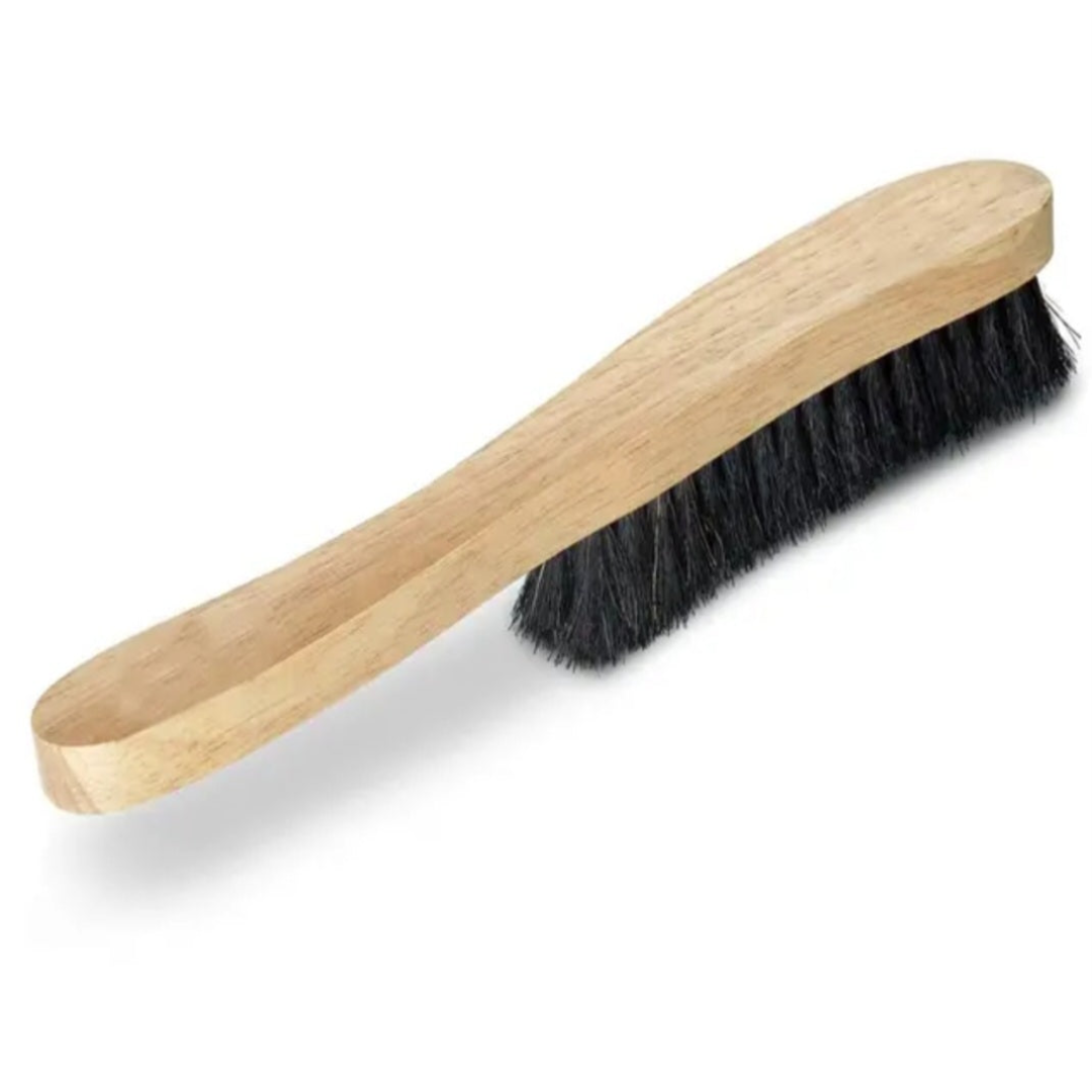 Wooden brush with black bristles on a white background - Zstander