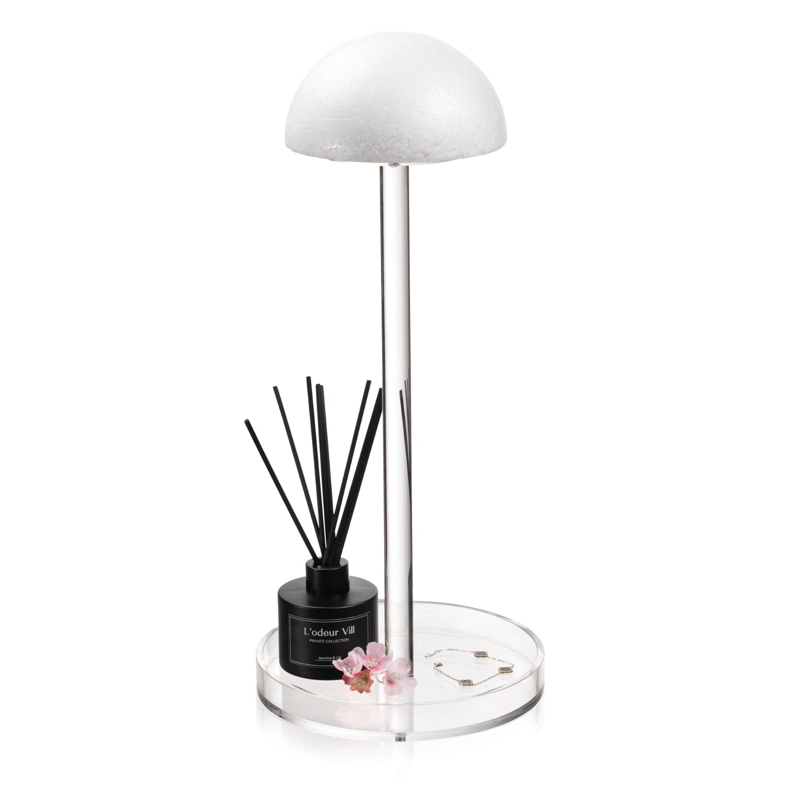 Wig Head with a perfume bottle and flower on a white background