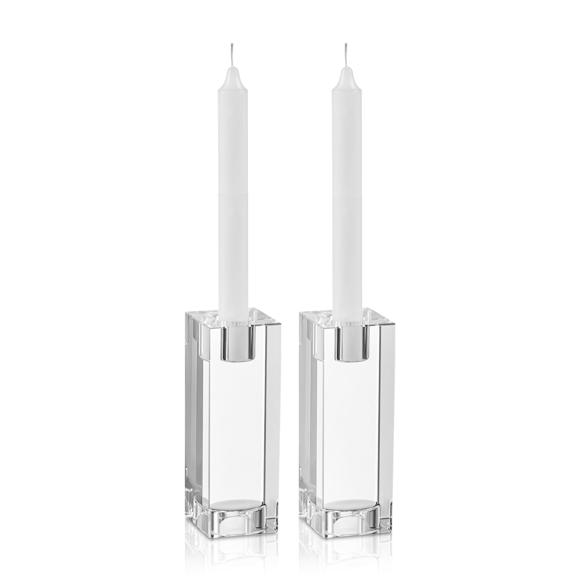 Two clear glass candle holders with white candles on a white background - Zstander