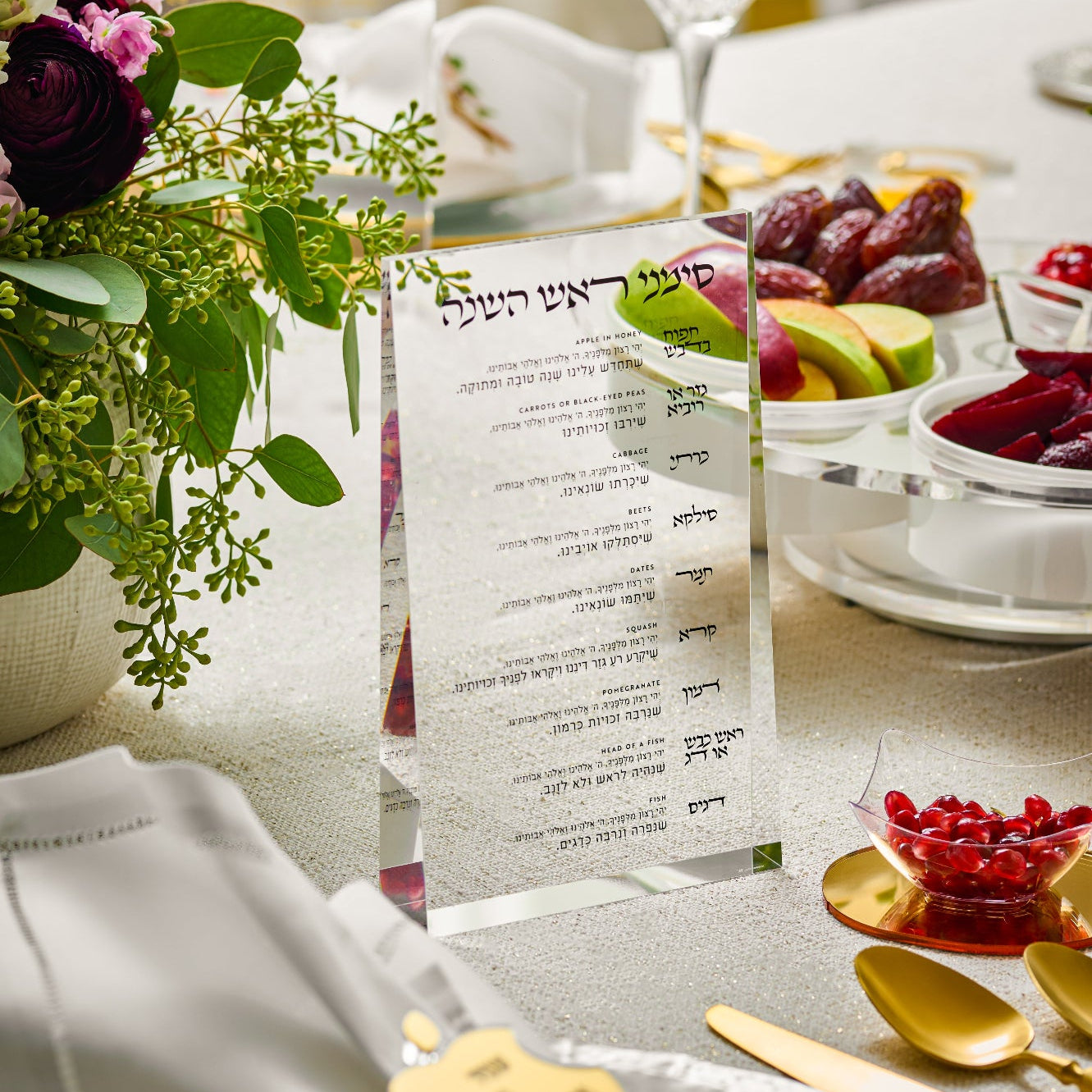 Dining table setting with a rosh hashana Simanim cards, fruit, and flowers - Zstander