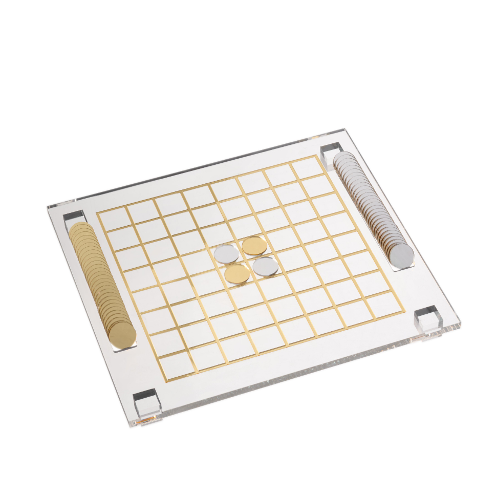 Othello Board game set with a grid and three round pieces on a white background - Zstander