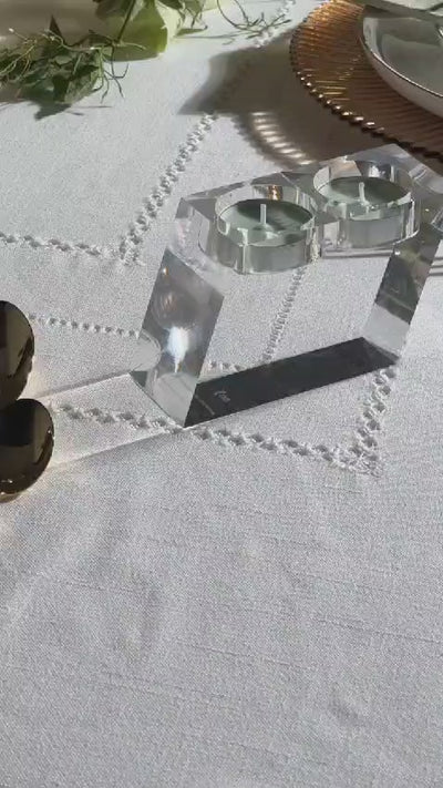 display of angled teal ight holder on a table
