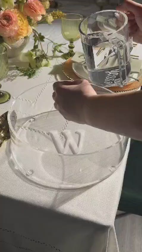 pouring water with a clear lucite washing cup