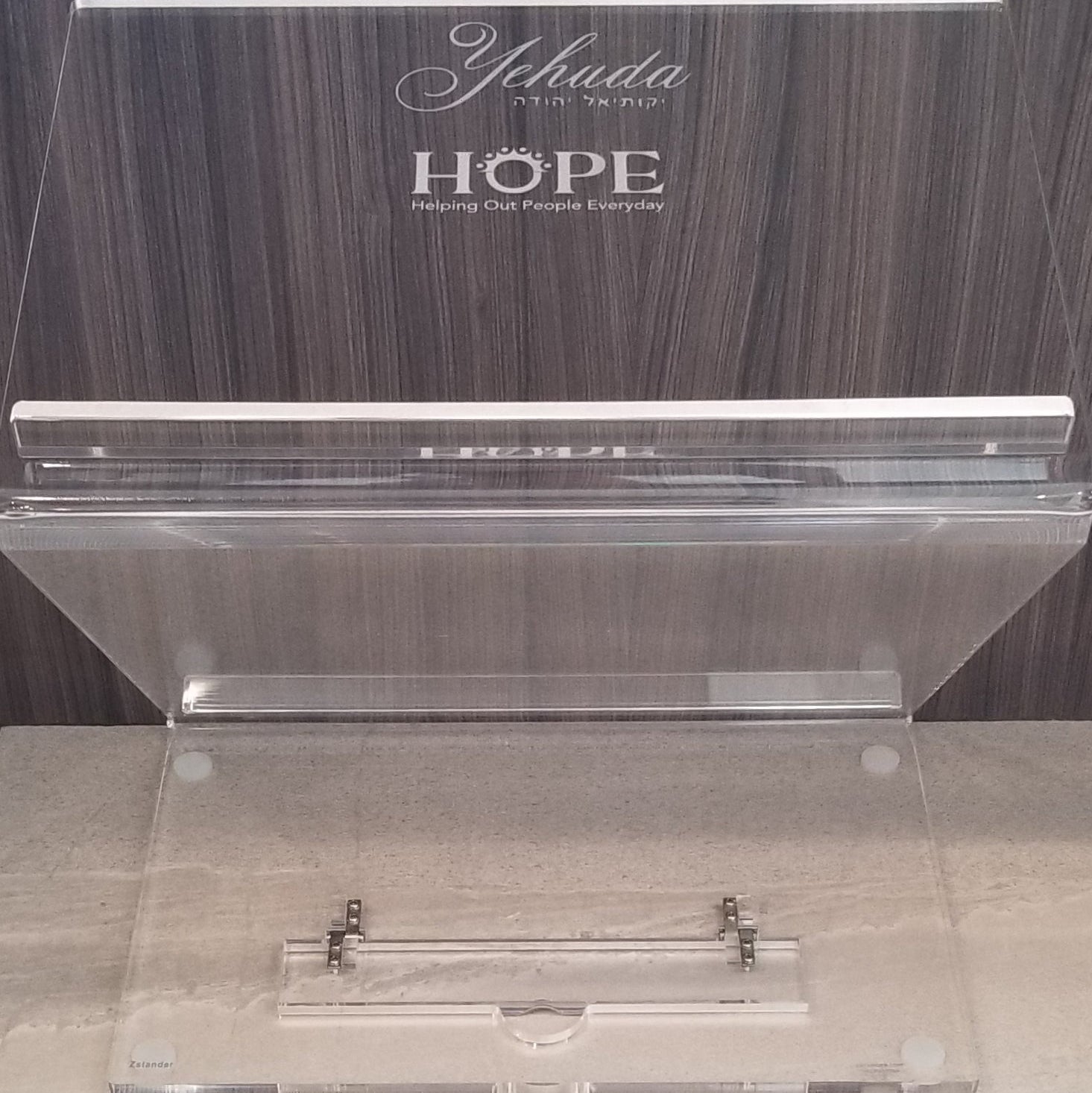 Clear lucite shtender with engraving on a wooden desk - Zstander