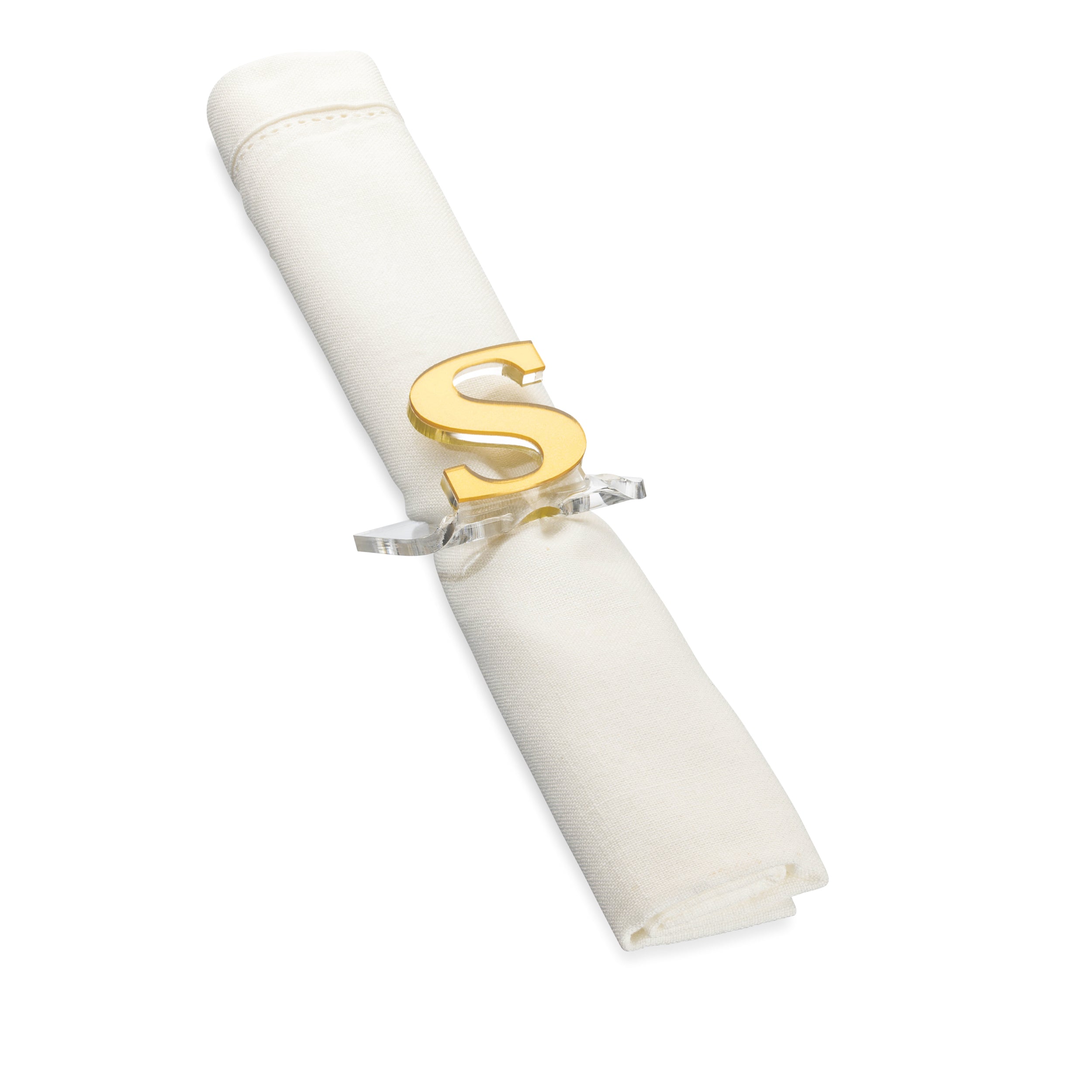 A clear lucite napkin ring with a monogrammed letter 'S' in gold - Zstander