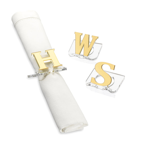 3 napkin rinks with the letters W,S,and H. H is on a napkin on a white background - Zstander